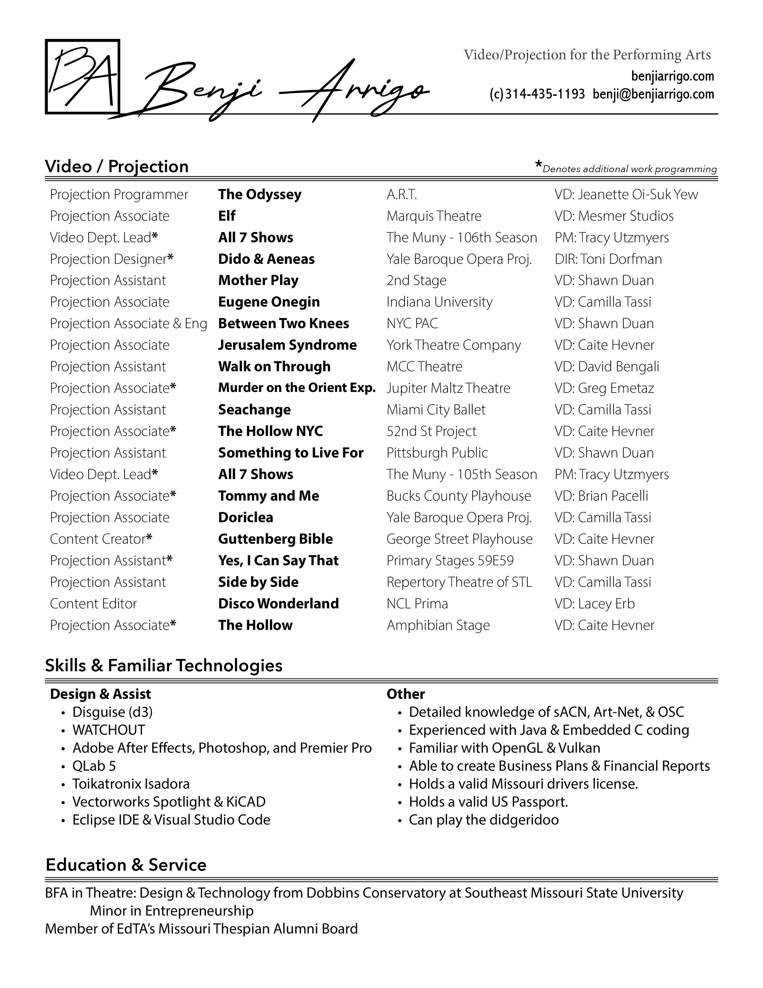 Benji Arrigo 2023 Headshot. Red Hoodie & short hair.